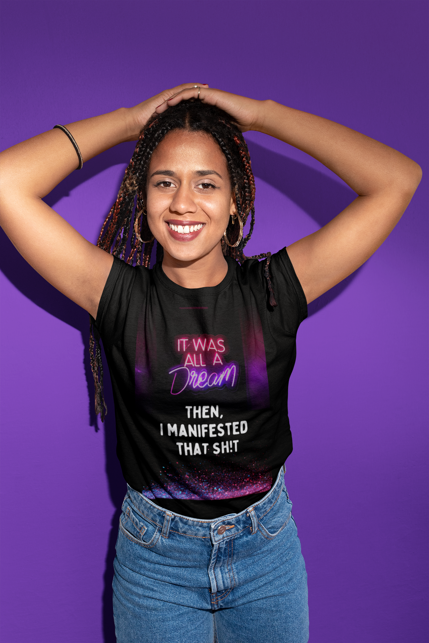 Smiling black women wearing a manifesting t-shirt- It Was All A Dream tee.