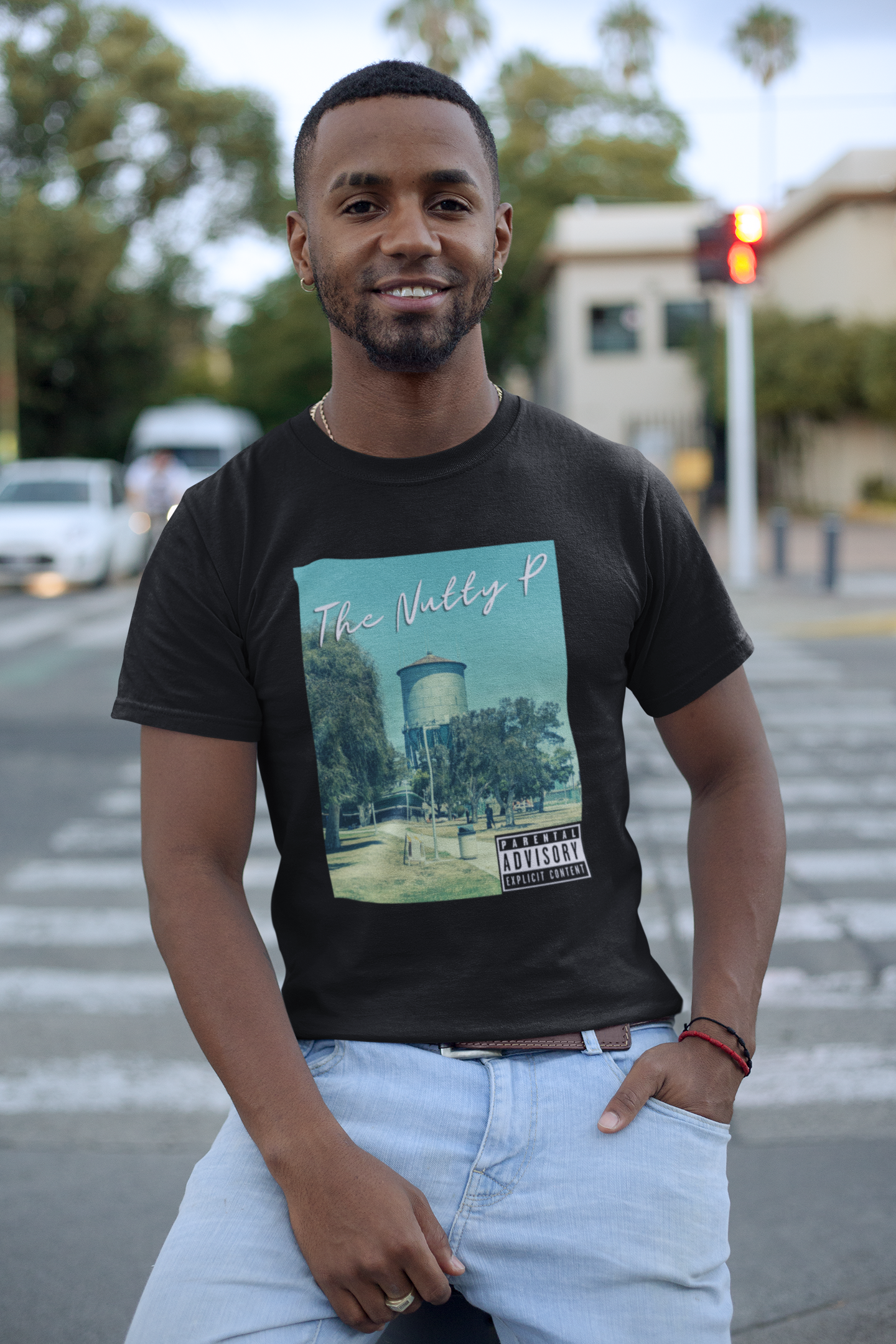 Cool guy standing on street corner wearing North Park Water Tower T-shirt