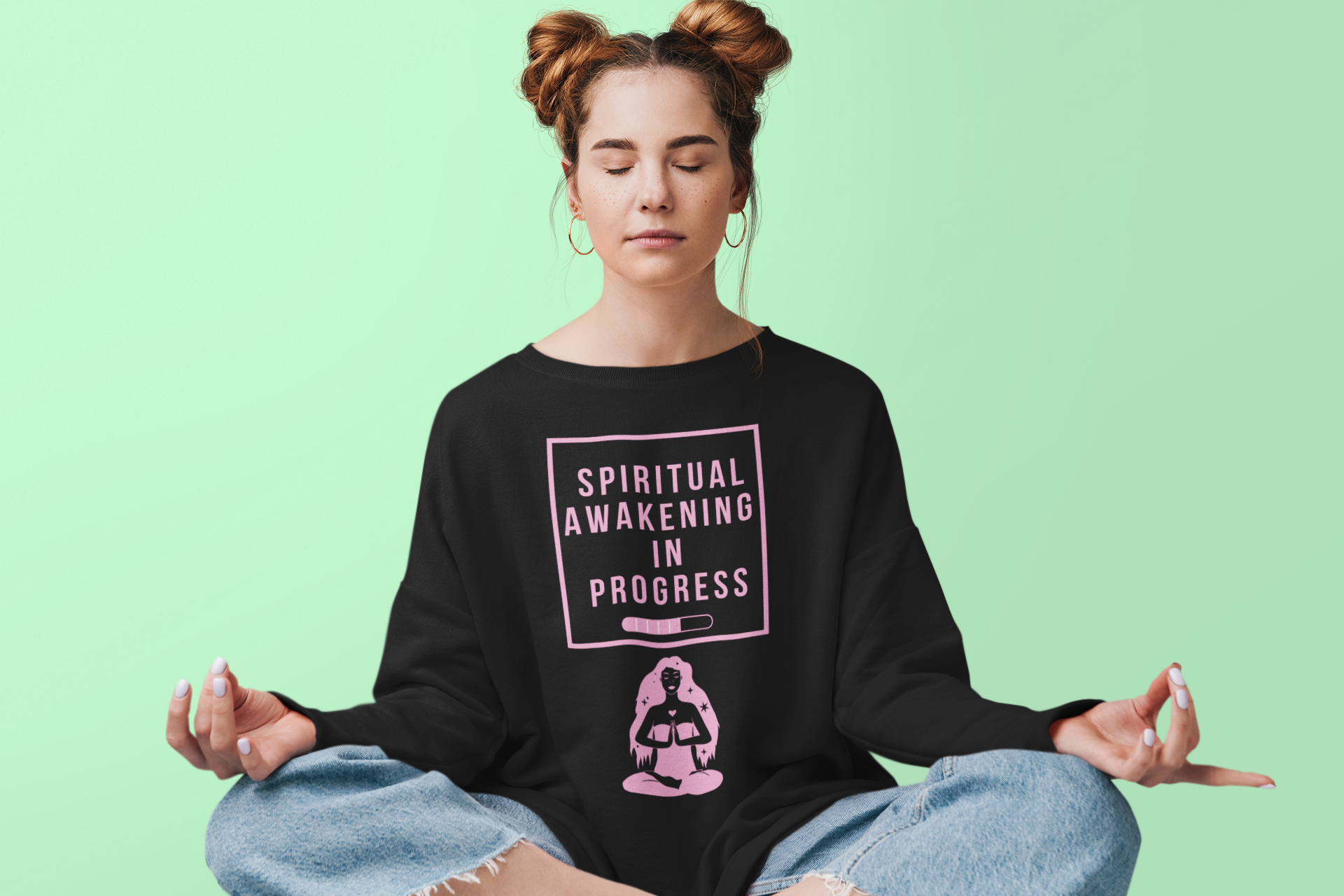 Spiritual woman meditating wearing a spiritual awakening t-shirt.